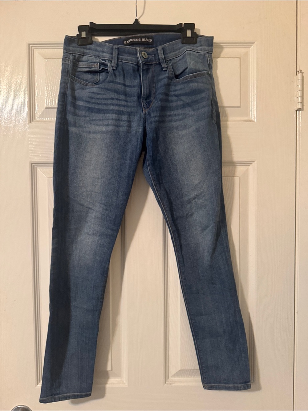 Express Women’s Skinny Legging Jeans - Medium Blue.